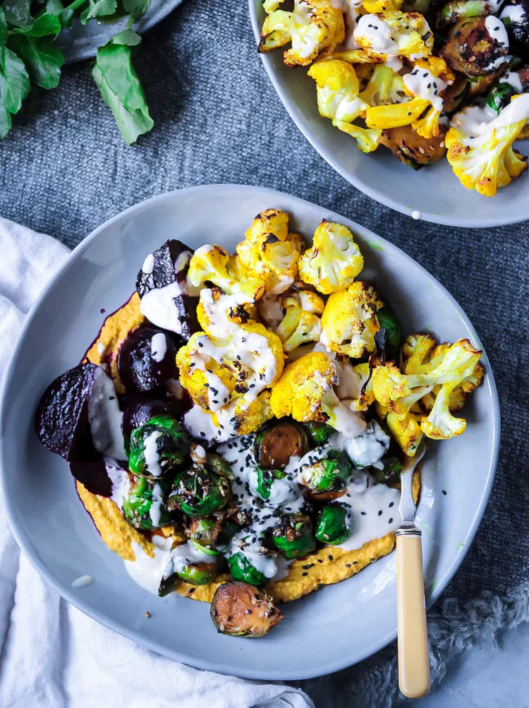 Roast Turmeric & Cauliflower Winter Salad with ChicP Carrot, Ginger and Turmeric Hummus.